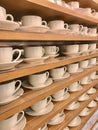 Rows of white tea cups Royalty Free Stock Photo