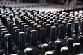 Rows of wine bottles in a winery