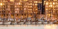 Rows of wooden boats in front of modent apartment complexes at SÃÂ¸renga..