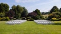 Rows of wooden chairs set up for wedding Royalty Free Stock Photo