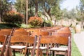 Rows of Wooden Event Chairs at Wedding Venue Abstract Royalty Free Stock Photo