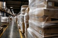 Pallets of wrapped boxes line a bustling warehouse aisle ready for shipping. Generative AI Royalty Free Stock Photo