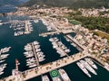 Rows of yachts along several marina piers. Porto, Montenegro. Top view