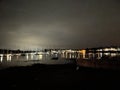 Rows of yachts in the harbour at night