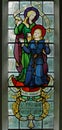 Memorial stain glass window depicting \