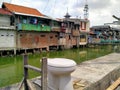 Roxy mas, Jakarta, InUnused toilet with a slum background