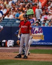 Roy Oswalt looks at the third base coach.