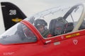 Royal Air Force Pilot Flight Lieutenant Mike Child in the cockpit of a Red Arrows British Aerospace Hawk T.1 jet trainer aircraft. Royalty Free Stock Photo