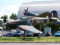 A Spitfire and a Hurricane on display at the main entrance of the museum. Royalty Free Stock Photo