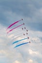 Royal Air Force RAF Red Arrows formation aerobatic display team flying British Aerospace Hawk T.1 Jet trainer aircraft. Royalty Free Stock Photo