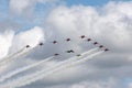 Royal Air Force Red Arrows team flying in formation with a Hawker Hunter and two Folland Gnats. Royalty Free Stock Photo