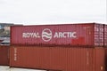 Royal Arctic and Triton steel shipping containers stacked on pier