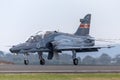 Royal Australian Air Force RAAF BAE Hawk 127 lead in fighter trainer aircraft A27-33 lands with the aid of a drogue chute.