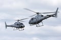 Royal Australian Navy Aerospatiale AS-350B Helicopters N22-001 & N22-016 from HMAS Albartoss flying in close formation