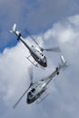 Royal Australian Navy Aerospatiale AS-350B Helicopters N22-001 & N22-016 from HMAS Albartoss flying in close formation