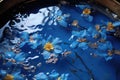 royal blue bathwater with floating flower petals