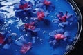royal blue bathwater with floating flower petals
