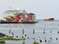 Astoria, Oregon, 9/16/2018, Royal Caribbean`s Explorer of the Seas cruise ship docked along side the Cannery Pier Hotel & Spa Royalty Free Stock Photo