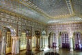 Royal City Palace Jaipur interior view of glass room with mirror and gold artwork at Rajasthan, India Royalty Free Stock Photo