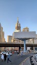 Royal Clock tower in Makkah, Saudi Arabia. Street view in Saudi Arabia. Flyover Bridge. People walking in the road.