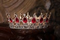 Royal crown with red gems. Ruby, garnet. Symbol of power and authority Royalty Free Stock Photo