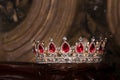 Royal crown with red gems. Ruby, garnet. Symbol of power and authority Royalty Free Stock Photo