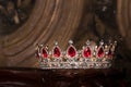 Royal crown with red gems. Ruby, garnet. Symbol of power and authority