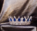 Royal crown with sapphire stones. Royalty Free Stock Photo