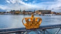 Royal crown and Stockholm old town Gamla Stan, Sweden