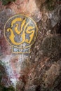 Royal cypher or monograms of Thailand king on rock wall