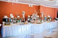 Royal elegance wedding reception table with different cookery food.