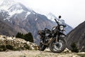 Royal Enfield Himalayan motorcycle against the background of mountains. Himachal Pradesh, India. Royalty Free Stock Photo