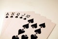 Royal flush cards poker hand in spades Royalty Free Stock Photo