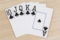 Royal flush clubs - casino playing poker cards Royalty Free Stock Photo