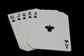 Royal Flush of clubs in poker authentic casino cards game on a black background