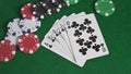 Royal Flush of Clubs and Poker Chips Royalty Free Stock Photo