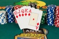 Royal flush of diamond casino cards and chips