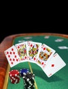 Royal Flush on Green Poker Table