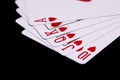 Royal flush. Playing cards isolated on black Royalty Free Stock Photo