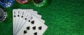 Royal flush in poker game. cards with casino chips on green cloth table. banner copy space Royalty Free Stock Photo