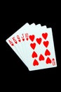 Royal flush sequence of playing cards on dark background Royalty Free Stock Photo