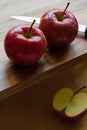 Royal Gala apples and knife on wooden background with copyspace Royalty Free Stock Photo