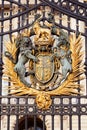 Royal golden coat of arms at the main Buckingham Palace gate Royalty Free Stock Photo