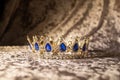 Royal  golden crown with blue stones. Jewellery Royalty Free Stock Photo