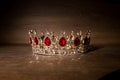 Royal golden crown with red stones. Royalty Free Stock Photo