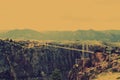 Royal Gorge Bridge and Park - Suspension bridge over the narrow Canyon of the Arkansas River in Colorado with mountains in backgro Royalty Free Stock Photo