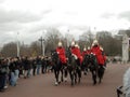 Royal Guard of Her Majesty Queen on horseback passing through the courtyard of the Palace of Westminster in London. December 26,