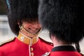 Royal Guard soldiers having an intimate conversation during the Trooping the Colour military ceremony, held once a year in London