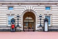 The royal guard standing near entrance to the inside yard of Buckingham Palace