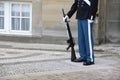 Royal guard with a weapon in a special uniform in Copenhagen, Denmark